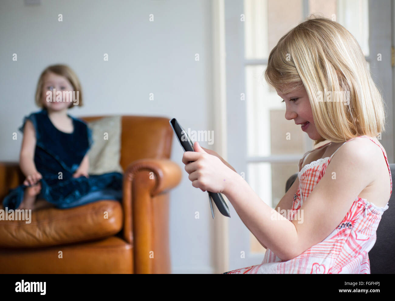 Les filles de l'ipad Banque D'Images