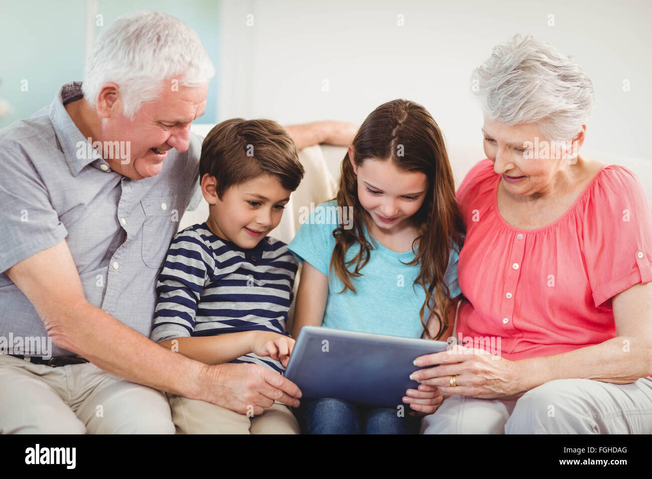 Senior couple avec leurs petits-enfants Banque D'Images