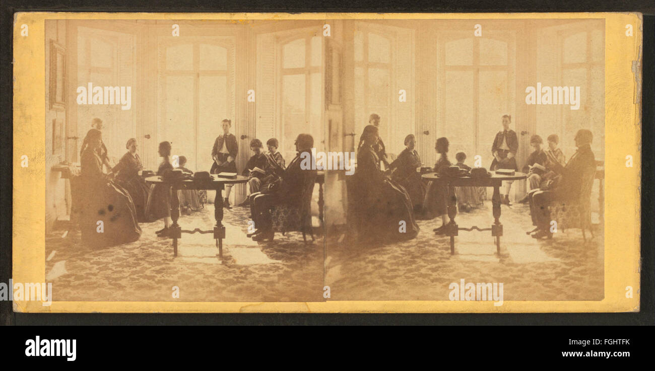 Une réunion de prière familiale, capturée dans une photographie stéréoscopique de la collection Robert N. Dennis. L'image montre une famille réunie dans la prière, reflétant le rôle de la religion et de la famille dans la vie quotidienne au XIXe siècle. Banque D'Images