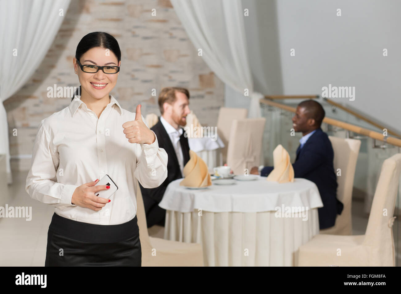 Business Woman showing thumb-up Banque D'Images