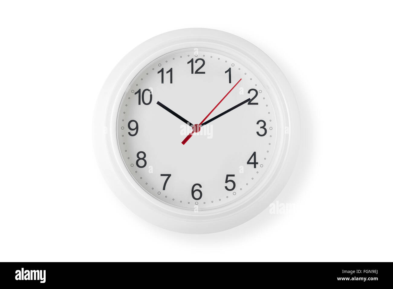 Réveil sur mur blanc Banque D'Images