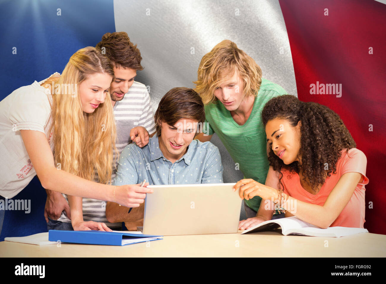 Image composite de college students using laptop in library Banque D'Images