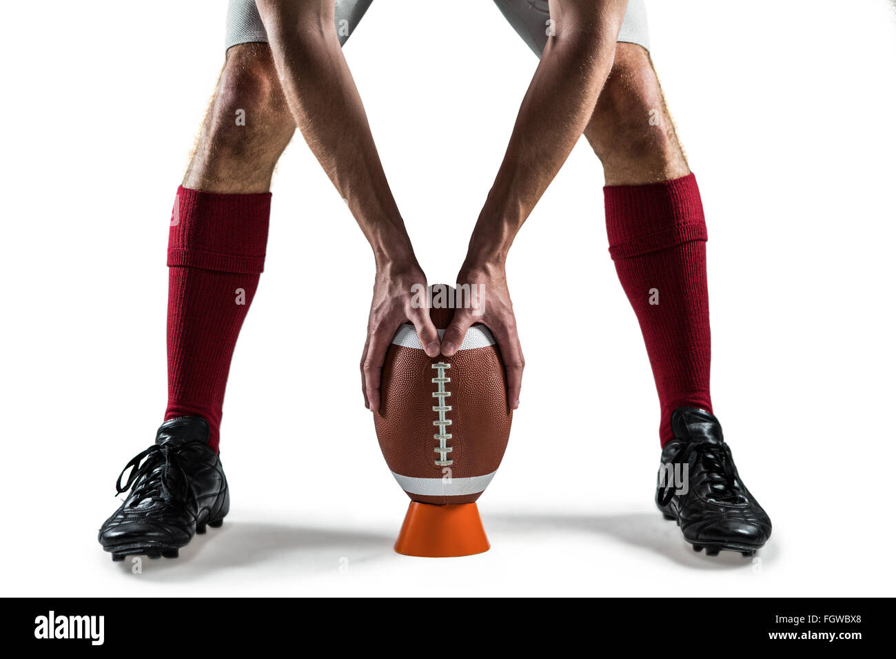 La section basse de sports joueur plaçant le ballon Banque D'Images