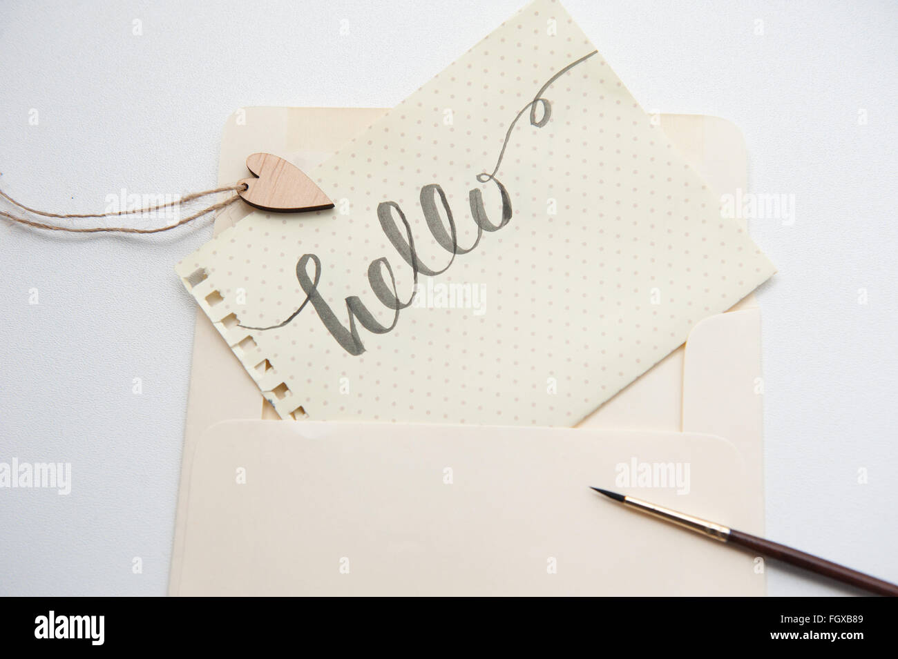 Motif coeur amoureux et paroles Hello pour carte greating Banque D'Images