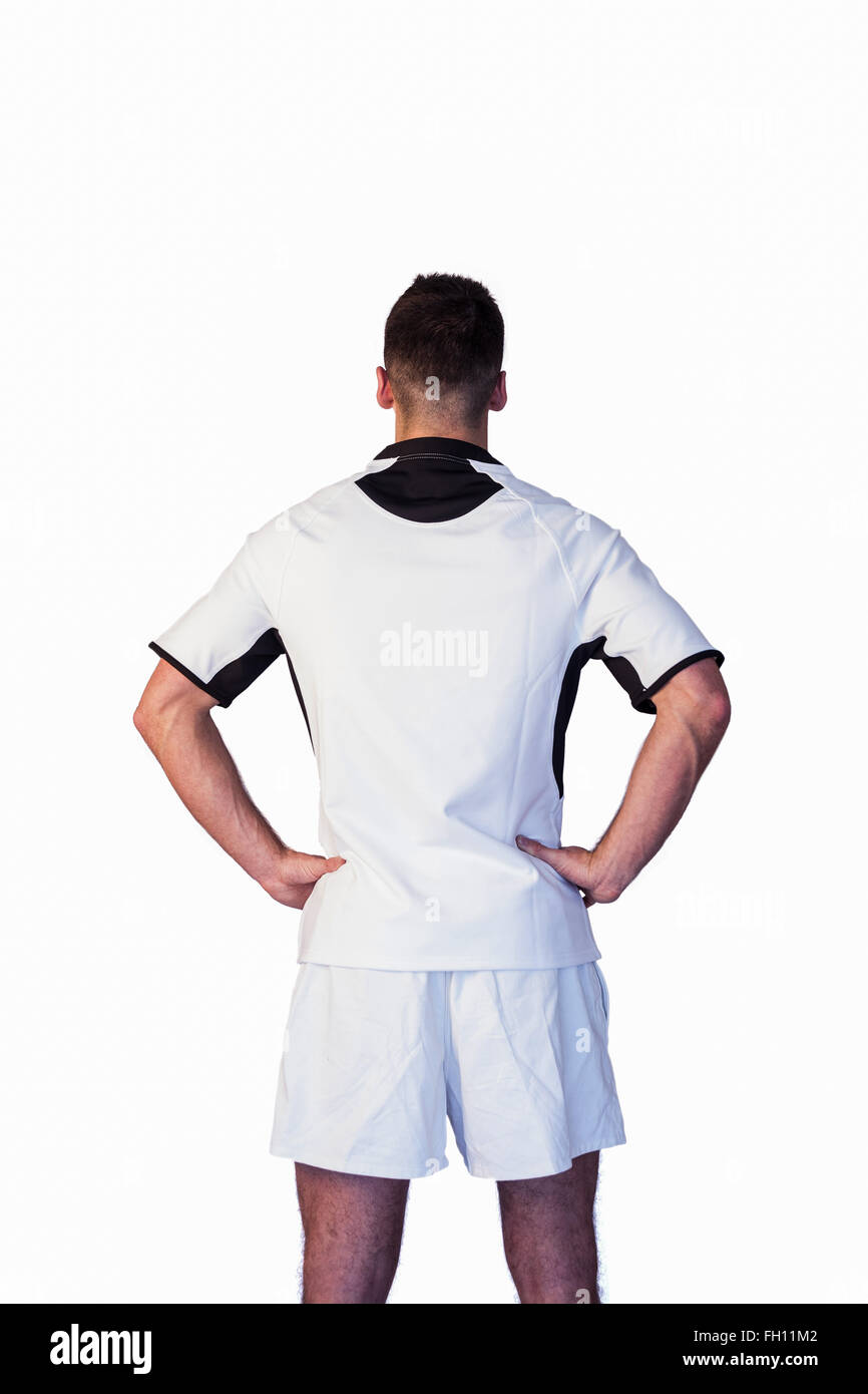 Vue arrière d'un joueur de rugby avec les mains de taille Banque D'Images
