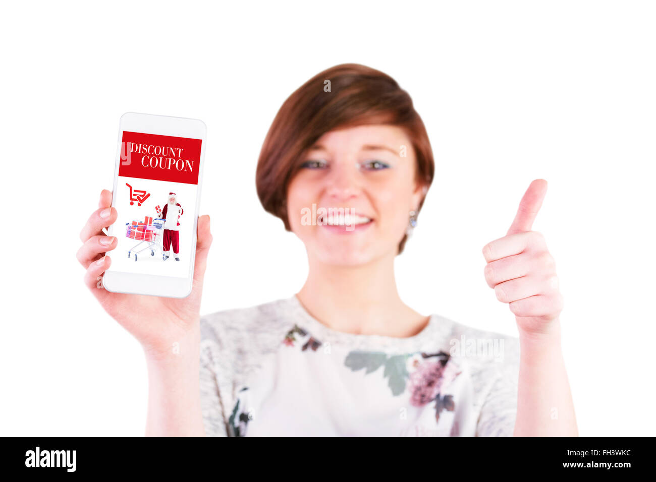 Image composite de happy woman gesturing Thumbs up tout en montrant smart phone Banque D'Images
