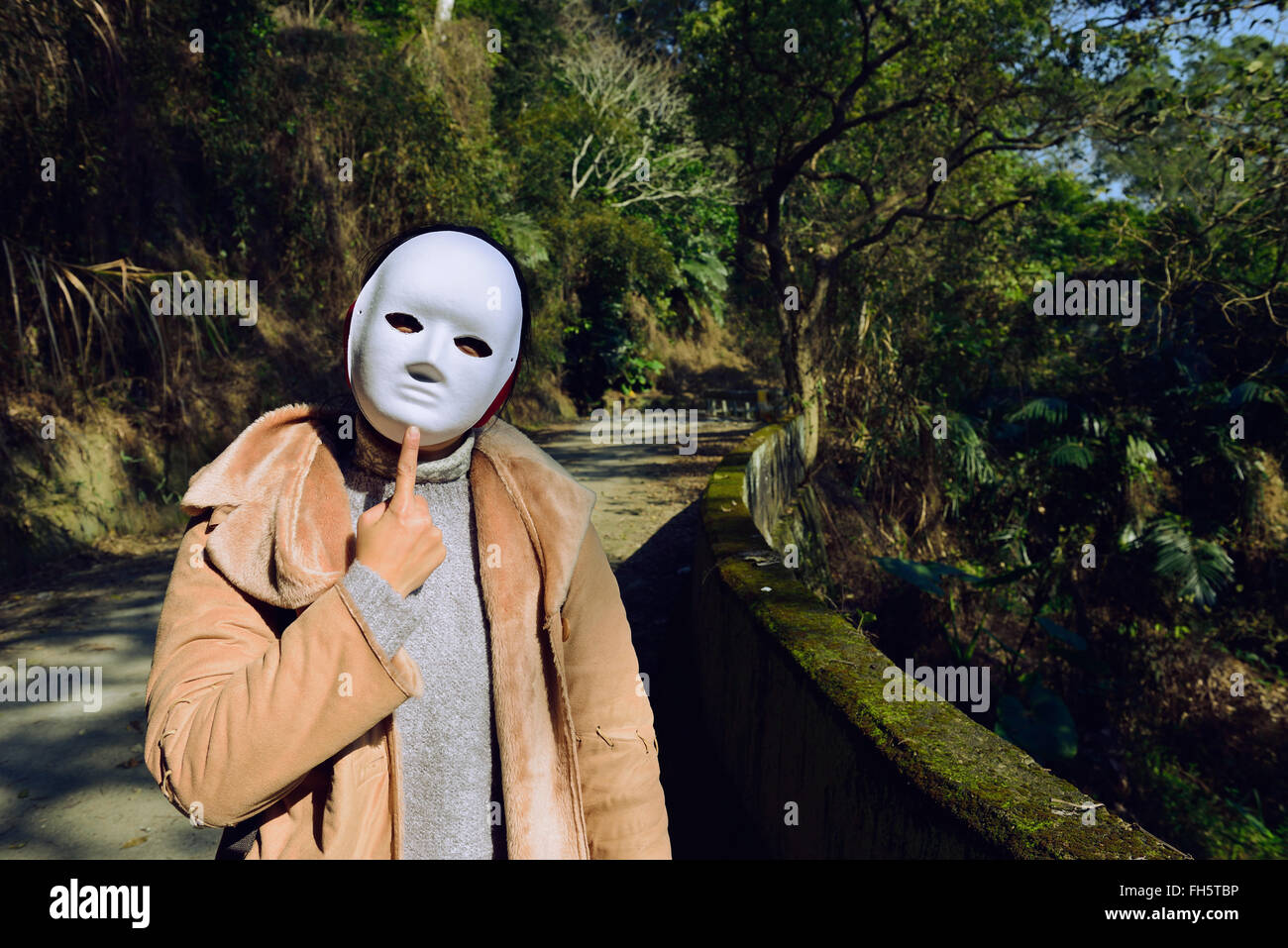 La femme portent le masque Banque D'Images
