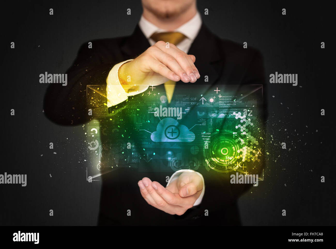 Businessman holding data cloud Banque D'Images
