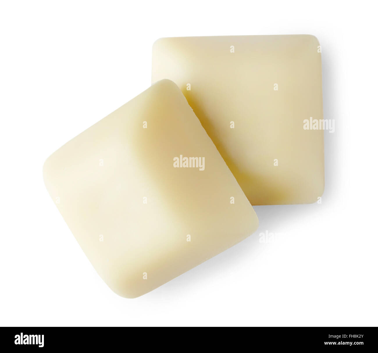 Morceaux de chocolat blanc isolé sur fond blanc ; Vue de dessus Banque D'Images