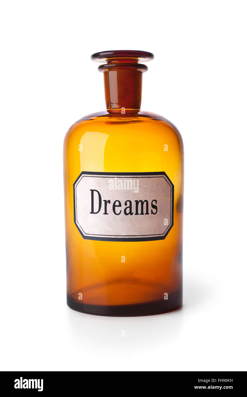 Ancienne pharmacie brun flacon de médicaments avec le mot rêves sur fond blanc Banque D'Images
