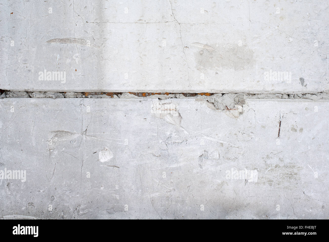 Arrière-plan de texture d'un mur blanc avec des petites fentes Banque D'Images