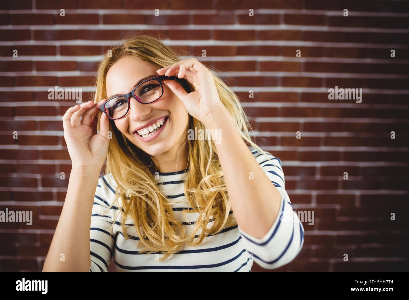 Portrait of blond woman dancing Banque D'Images