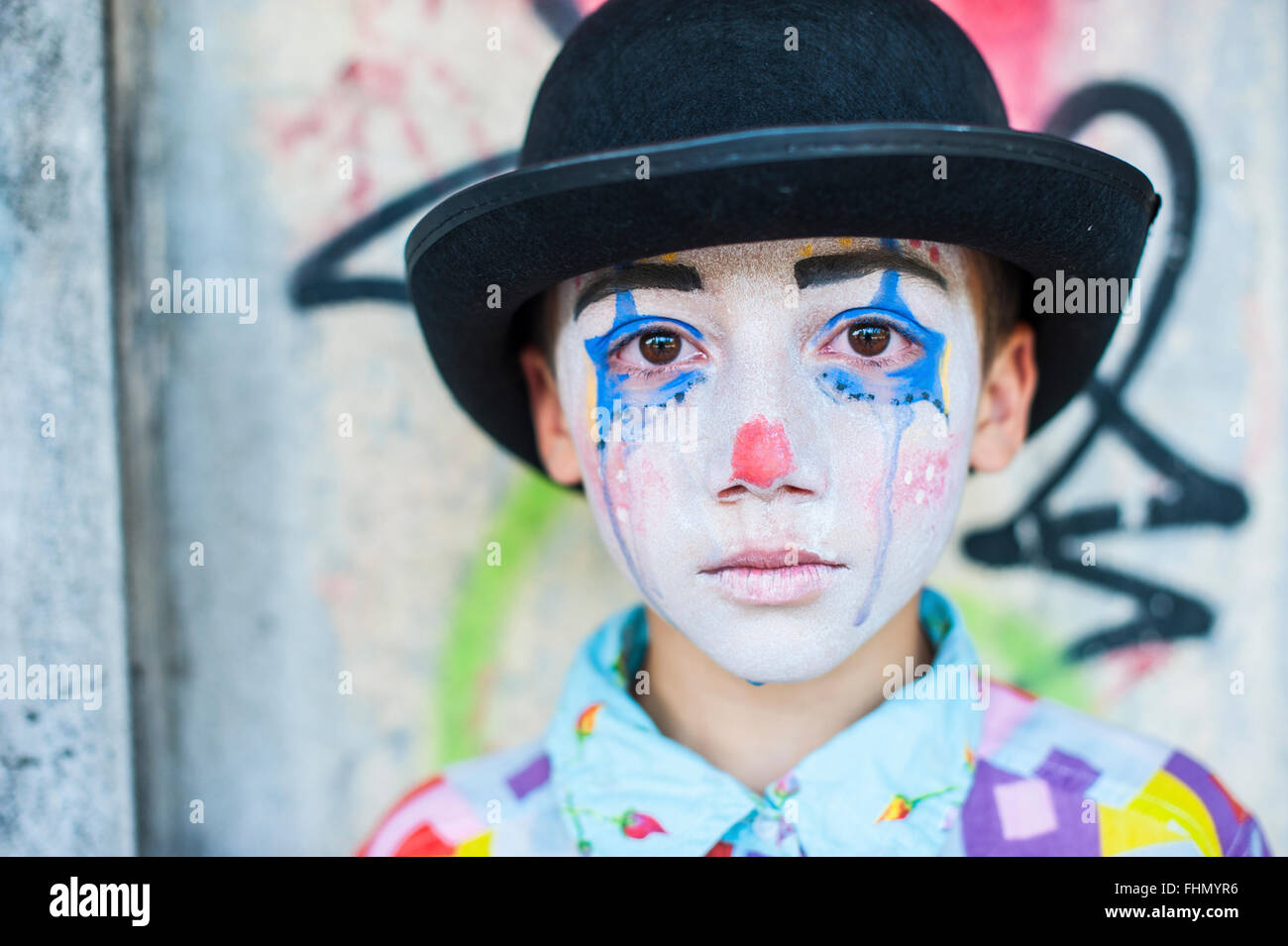 Portrait de garçon rouged triste comme un clown Banque D'Images