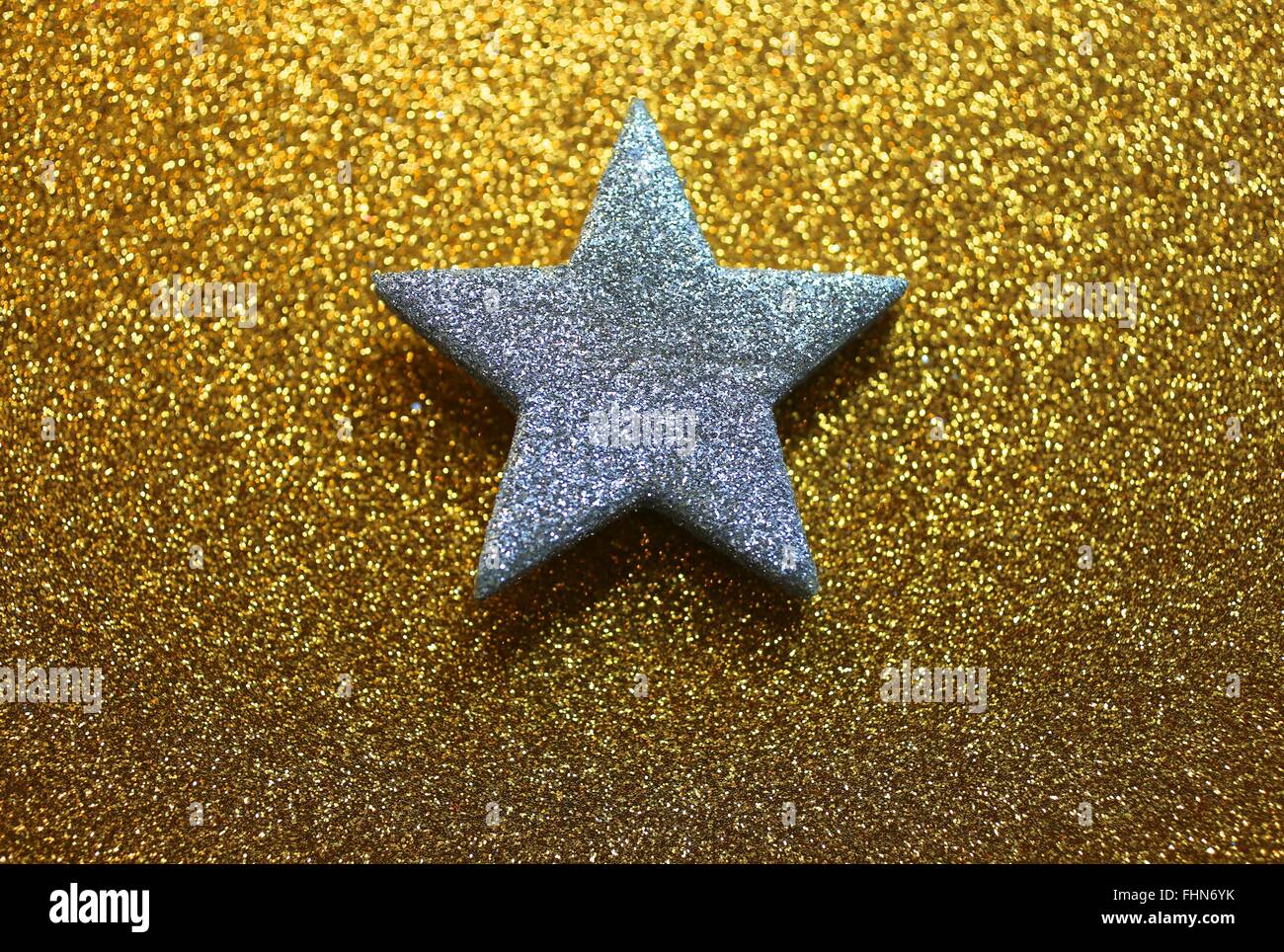 Lone Star lumineux sur fond brillant doré Banque D'Images