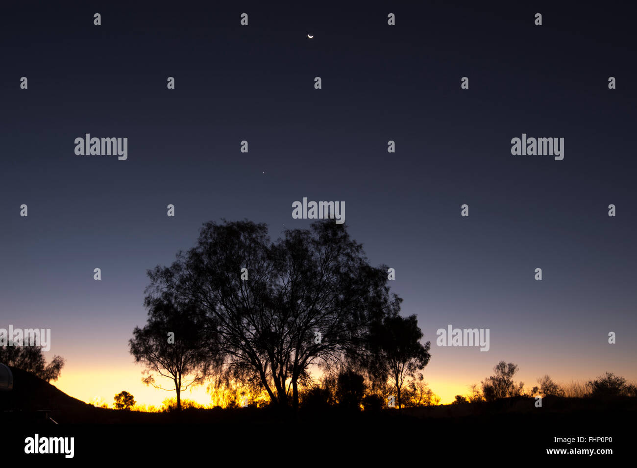 Coucher de soleil sur la West MacDonnell Ranges, Territoire du Nord, Australie Banque D'Images