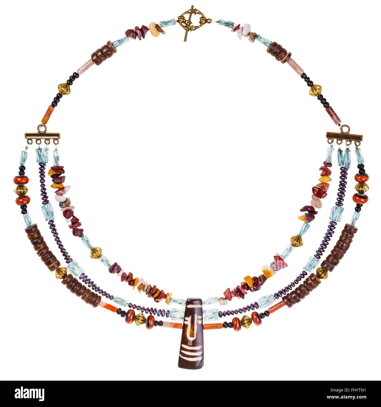 Collier style africain à partir de pierres naturelles tons (mookaite, Jasper), noix de coco et os sculptés, perles de verre, laiton, Orem, ba Banque D'Images