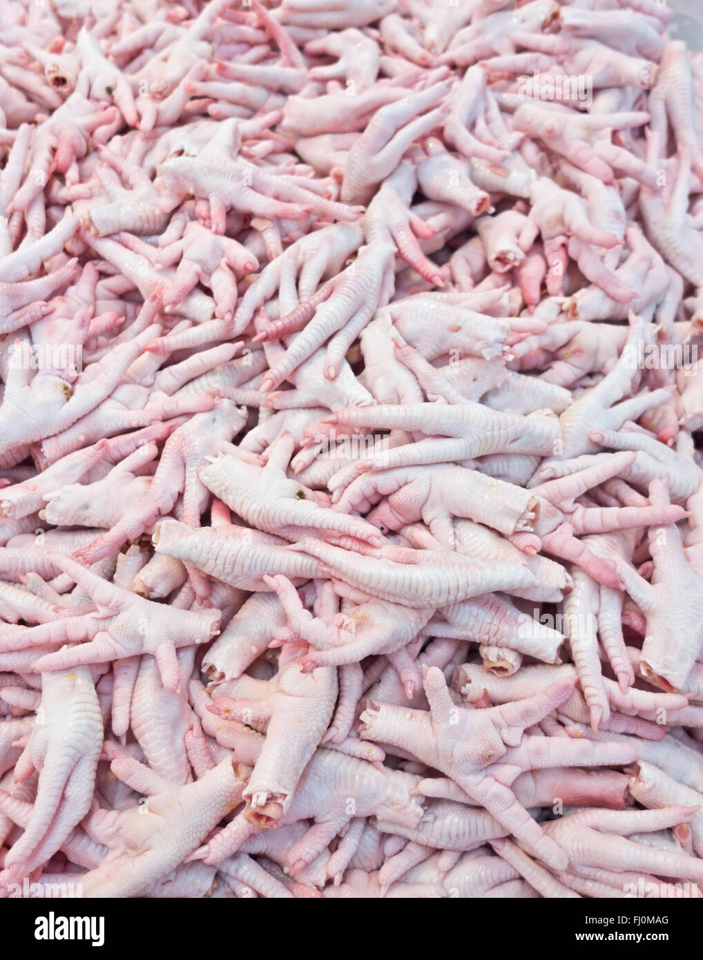 Close up de poulet cru pieds Banque D'Images
