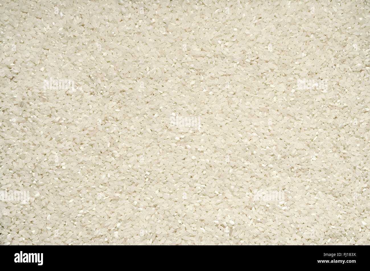 Background de grains de riz sur la surface Banque D'Images