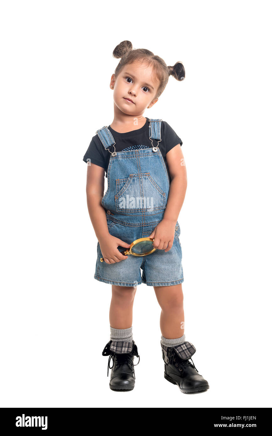 Cute baby girl loupe sur les mains.isolé Banque D'Images