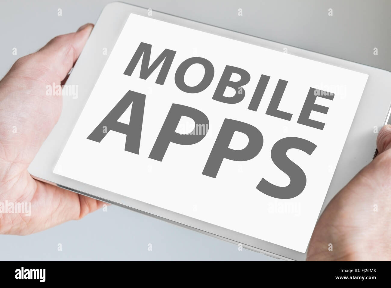 Mobile apps texte affiché sur l'écran tactile de la tablette ou smartphone. Concept pour le développement d'applications pour mobile d Banque D'Images