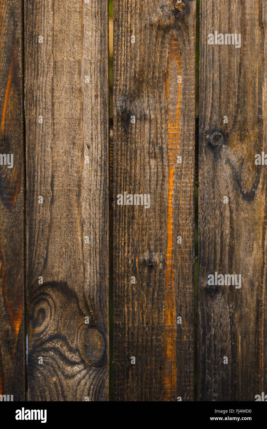 Fragment d'une vieille clôture en bois brun texture Banque D'Images