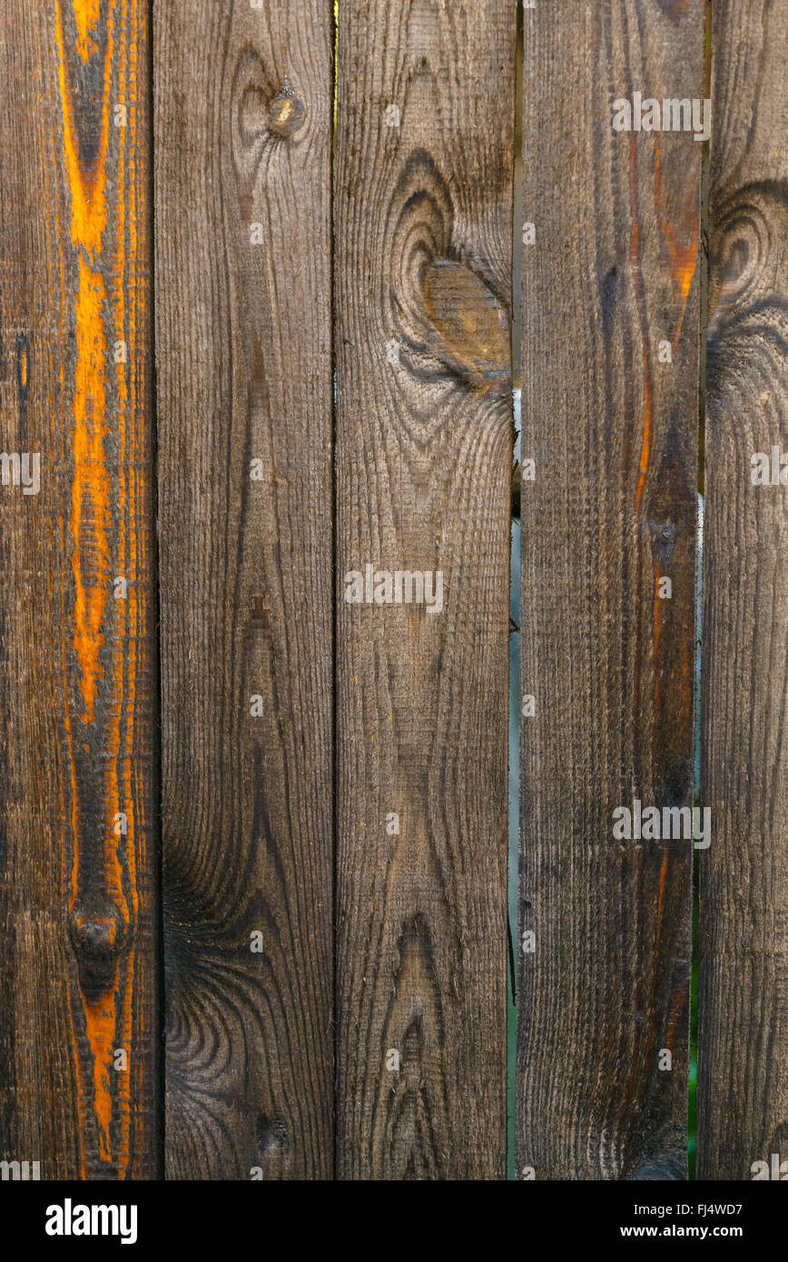 Fragment d'une vieille clôture en bois brun texture Banque D'Images