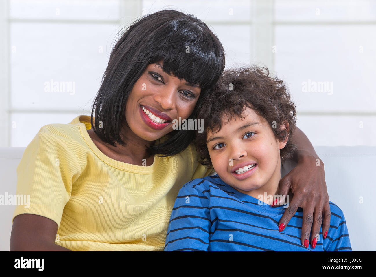 Smiling Mother jouant avec son At Home Banque D'Images