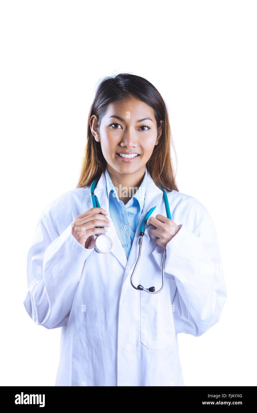 Asian doctor holding stethoscope Banque D'Images