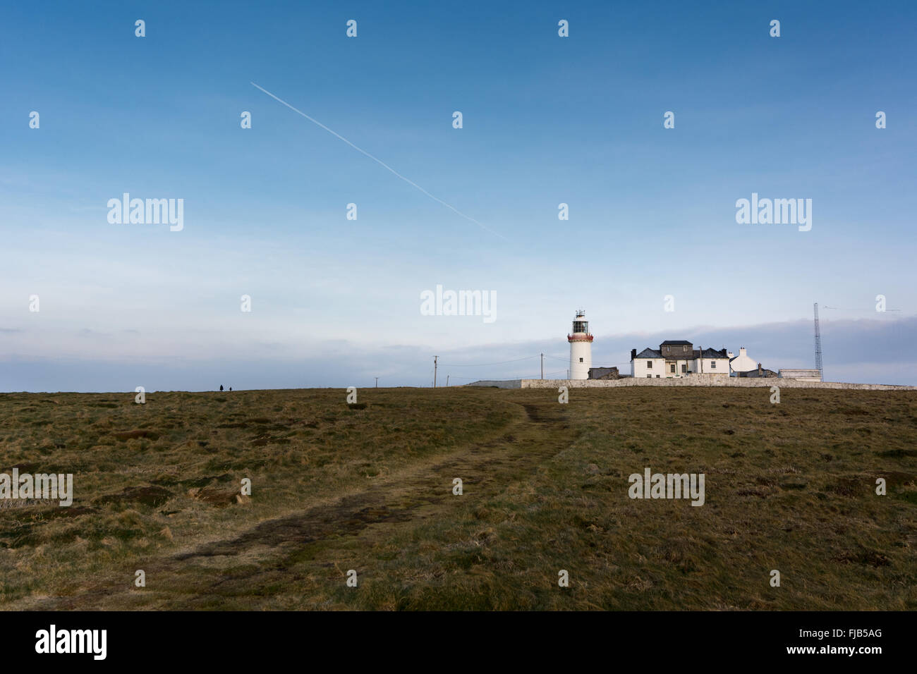 Tête de boucle et le phare sur Ciel bleu après-midi Banque D'Images