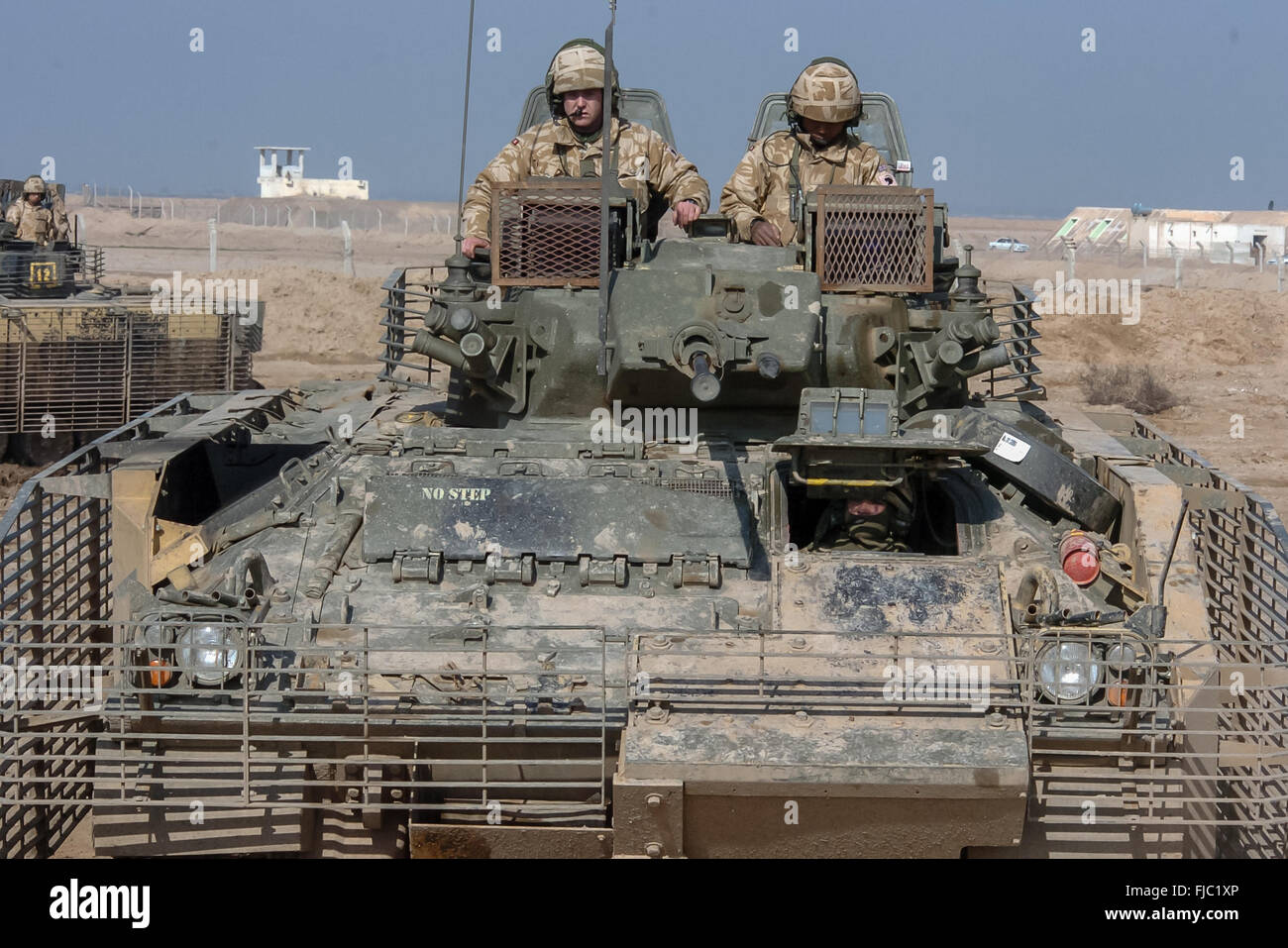 Le Welsh Guards battel group on il tour de service en Irak 2004. Ils ont été posté, juste à la sortie al Arhmar dans le sud de l'Iraq. et il comprenait l'élimination nomenclature trouve l'arme et des patrouilles de sécurité.Ils étaient là 2004/2005 op telic 5. Banque D'Images