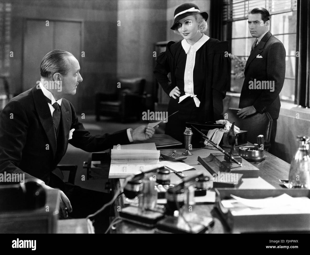 MONROE OWSLEY, Carole Lombard, DONALD COOK, bref moment, 1933 Banque D'Images