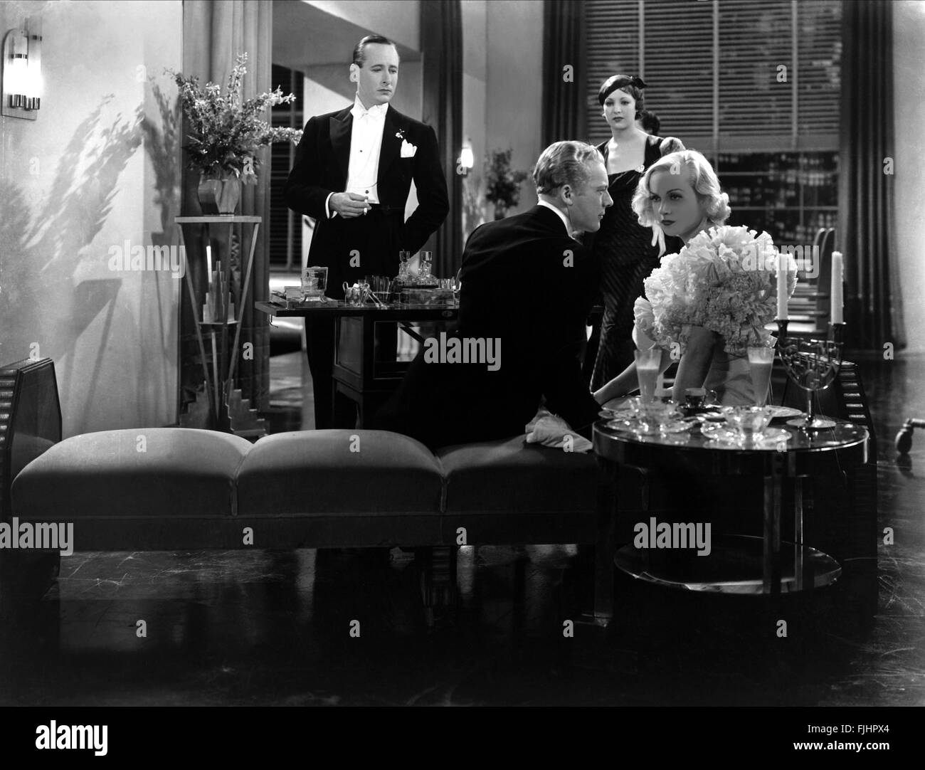 DONALD COOK, GENE RAYMOND, IRENE WARE, Carole Lombard, bref moment, 1933 Banque D'Images