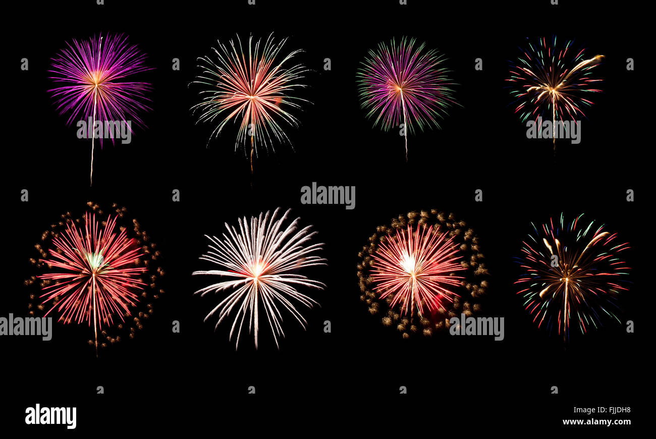 Une variété d'artifice colorées isolé sur fond noir Banque D'Images