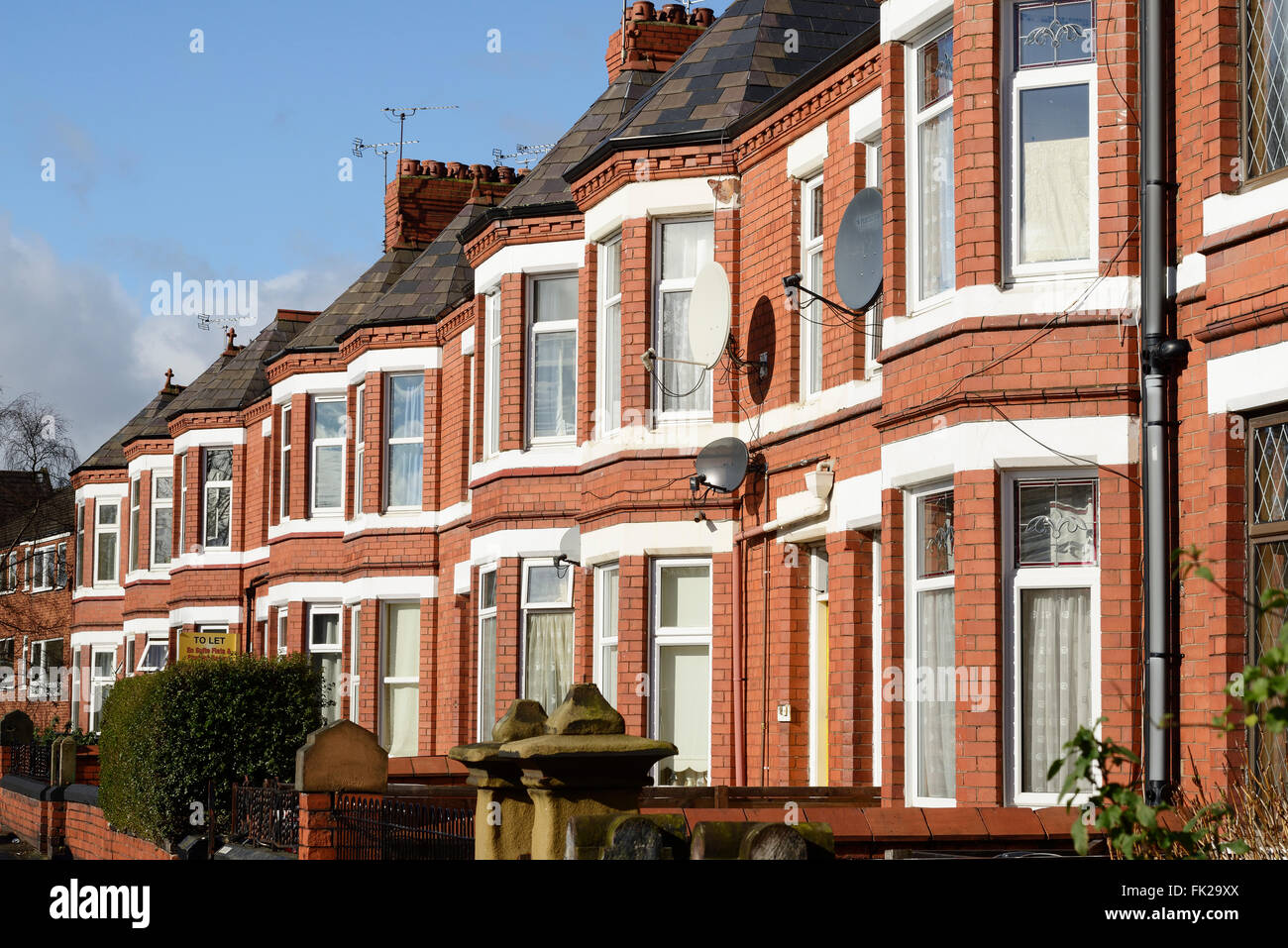 Rangée de maisons mitoyennes de style victorien à la façade de la baie Banque D'Images