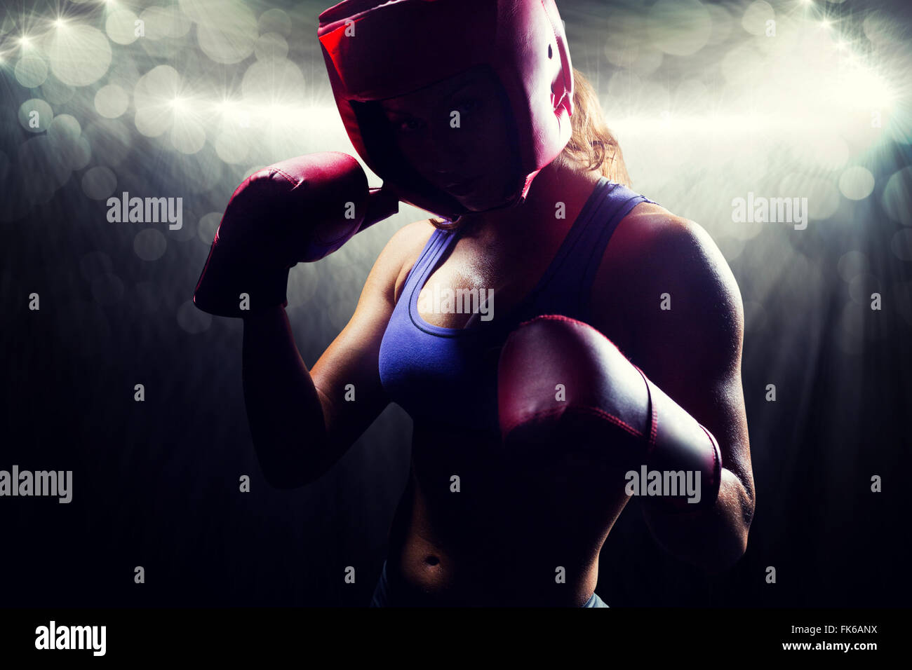 Image composite de portrait of female fighter avec position de combat Banque D'Images Image composite de portrait of female fighter avec position de combat Banque D'Images