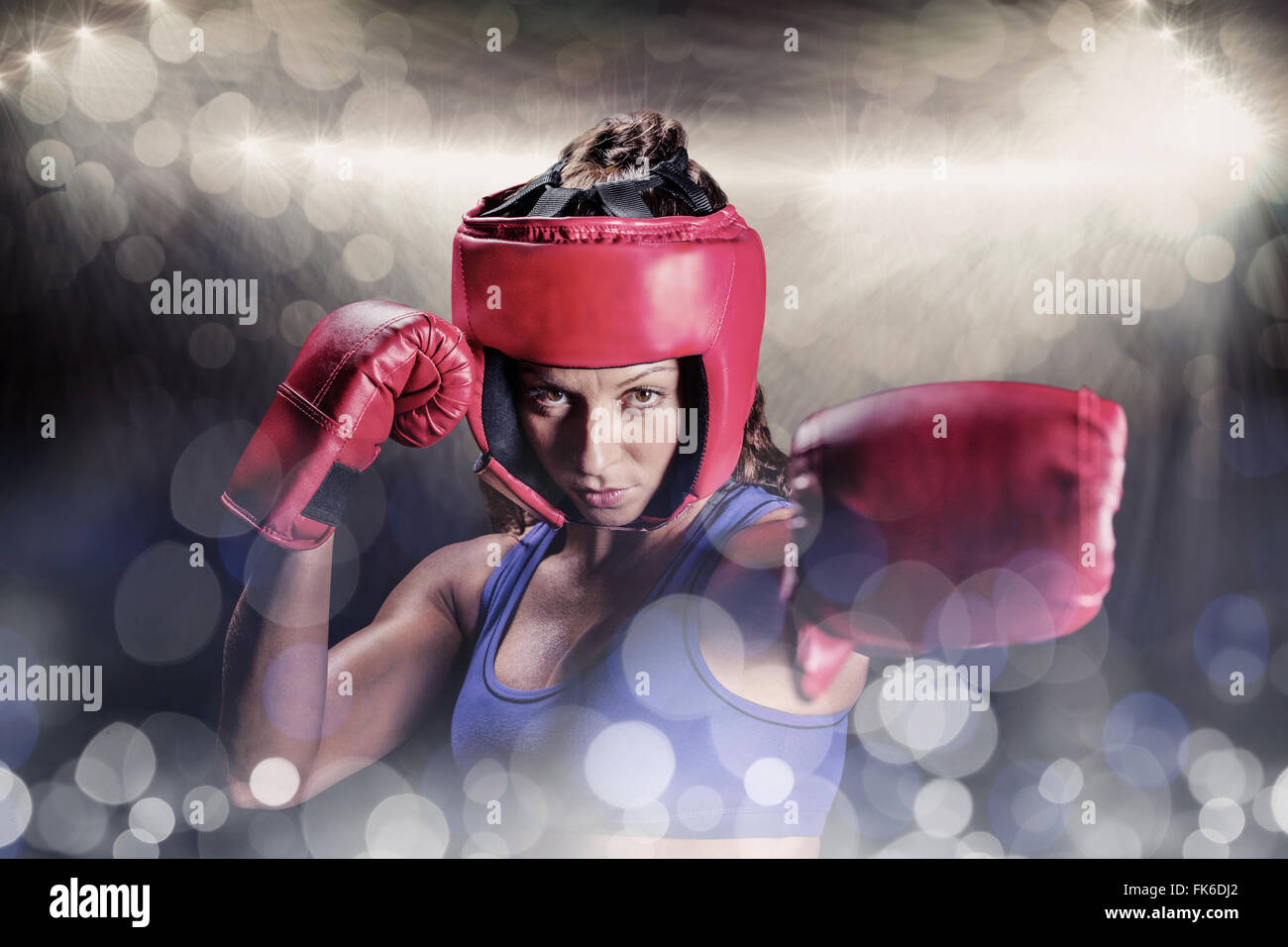 Image composite de portrait de boxer avec des gants et coiffures Banque D'Images Image composite de portrait de boxer avec des gants et coiffures Banque D'Images