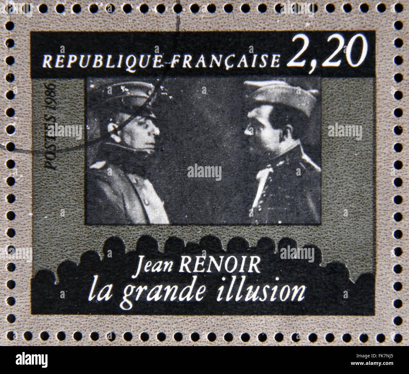 FRANCE - VERS 1986 : stamp dédiée au centenaire du cinéma français montre Jean Renoir "Grande Illusion", vers 1986 Banque D'Images
