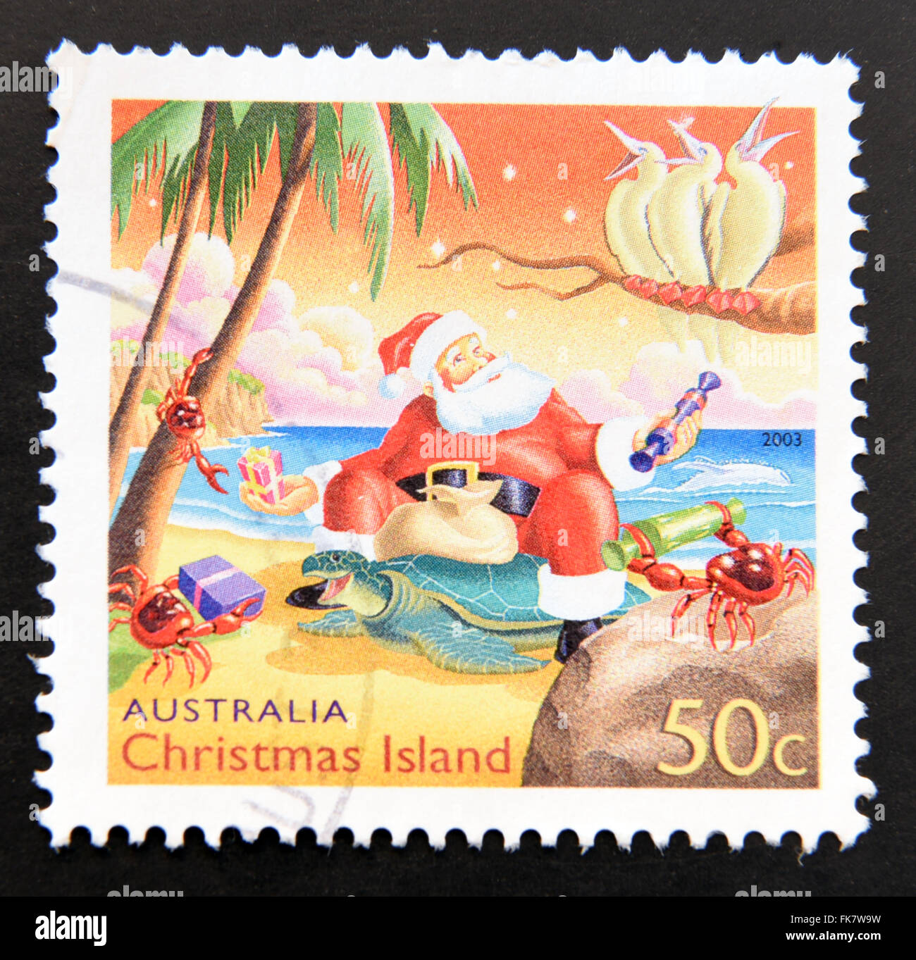 L'AUSTRALIE - circa 2009 : timbre imprimé en Australie dédié à Noël en Australie, montre le Père Noël à la plage, vers Banque D'Images