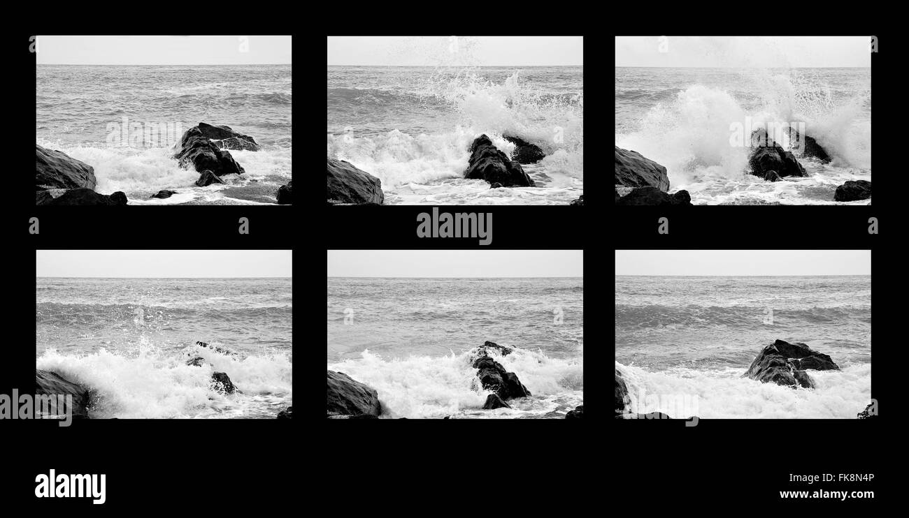 Les vagues qui les rochers Banque D'Images