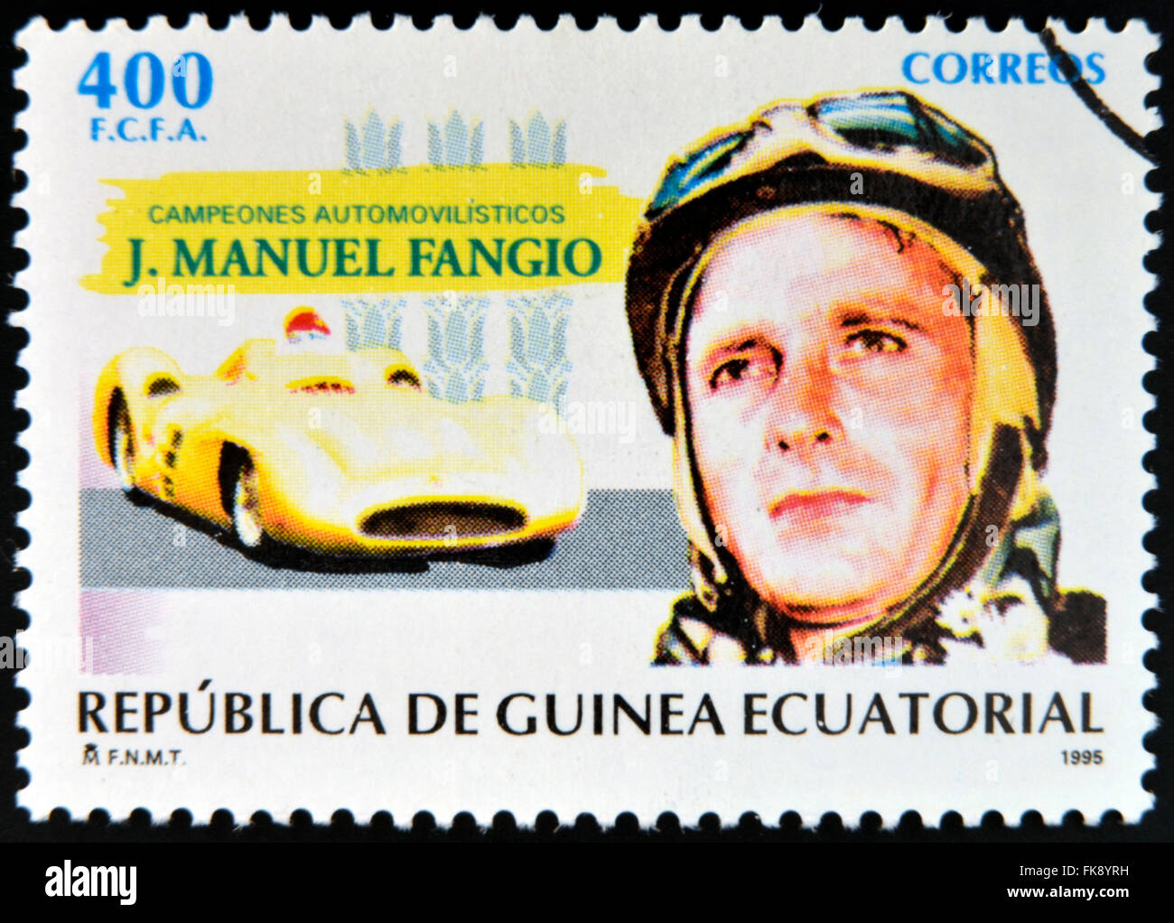 Guinée Équatoriale - circa 1995 : timbre imprimé en Guinée dédié aux champions de voiture, indique Juan Manuel Fangio, circa 1995 Banque D'Images