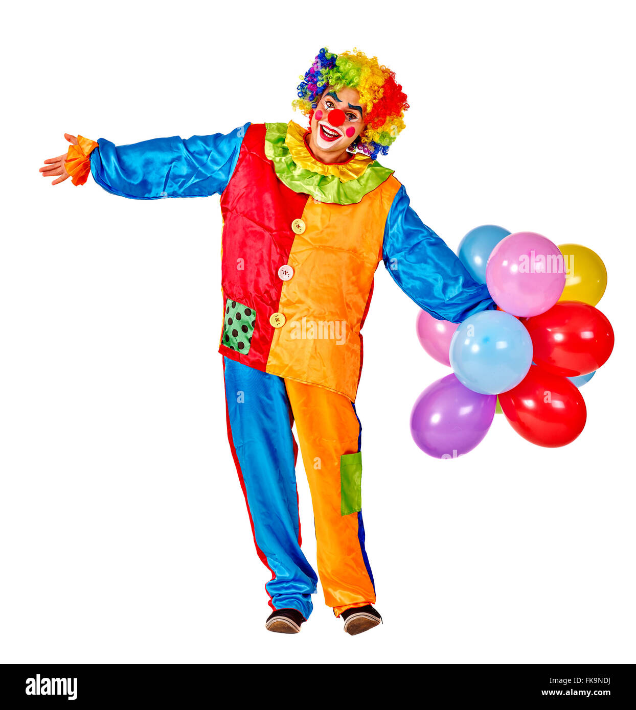 Joyeux anniversaire clown tenant un bouquet de ballons. Banque D'Images