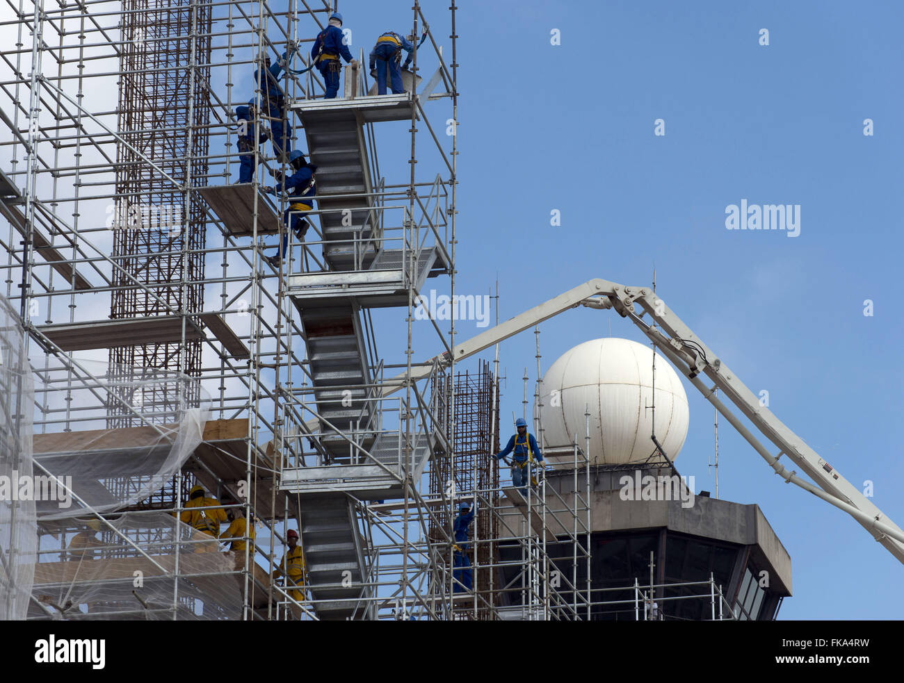 Coopératives dans les travaux de l'agrandissement de l'aéroport international Guarulhos de Sao Paulo / Banque D'Images