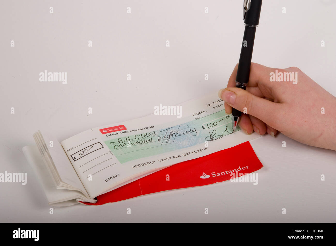 Écrire un chèque Banque D'Images