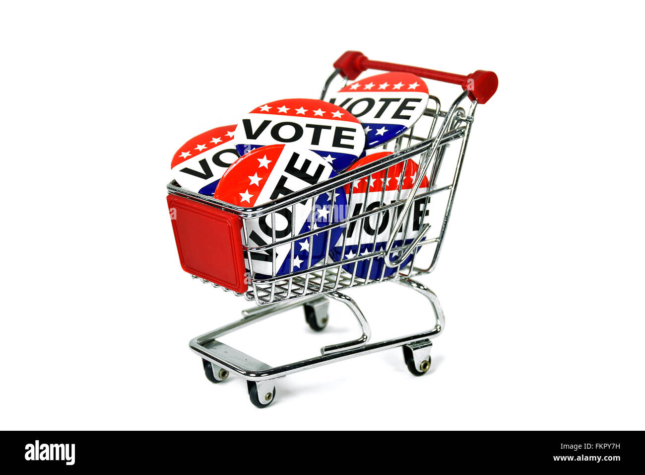 Les boutons de vote pour l'élection dans un panier isolé sur blanc. Banque D'Images