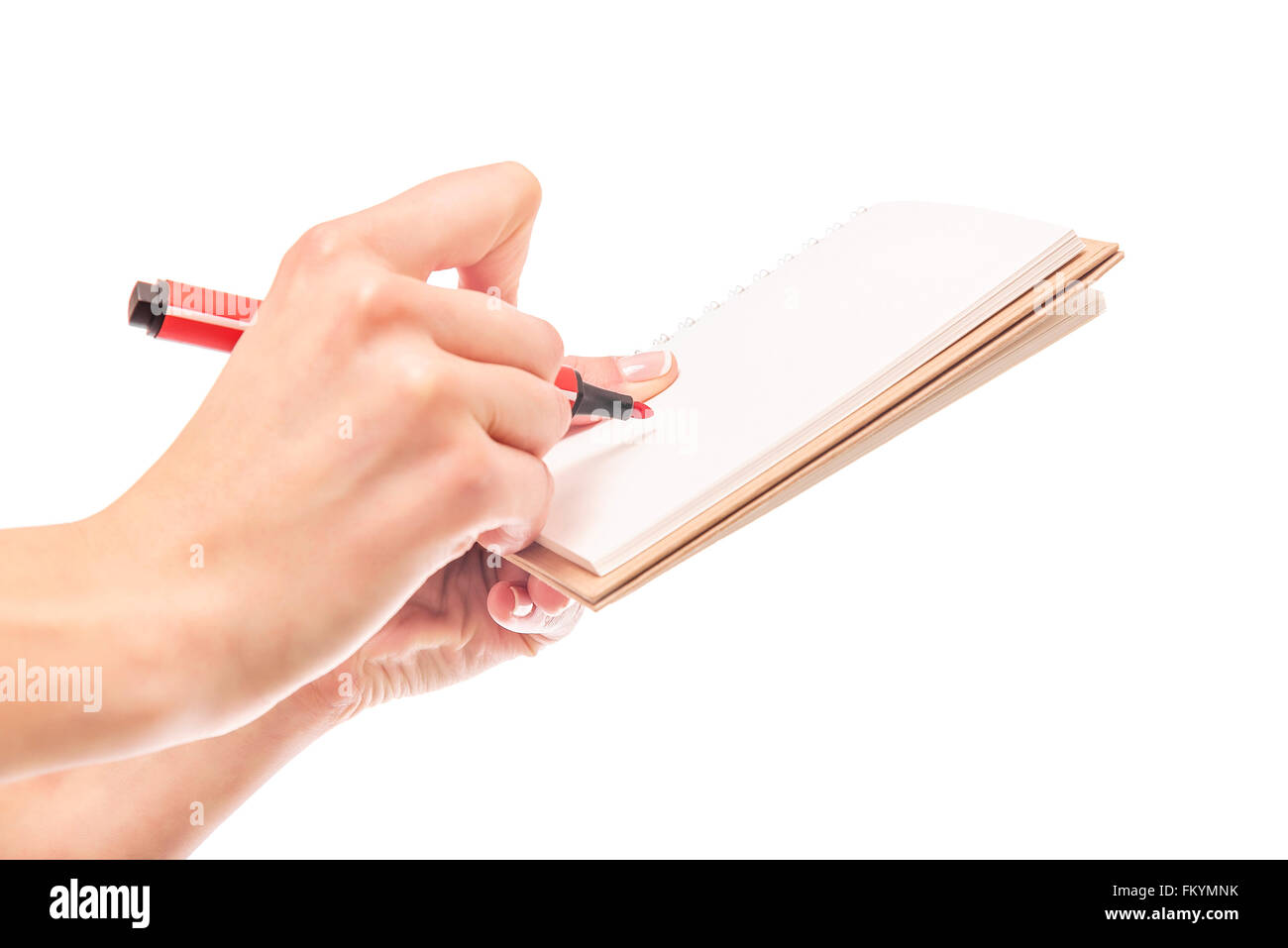 Ordinateur portable et stylo à la main. Banque D'Images