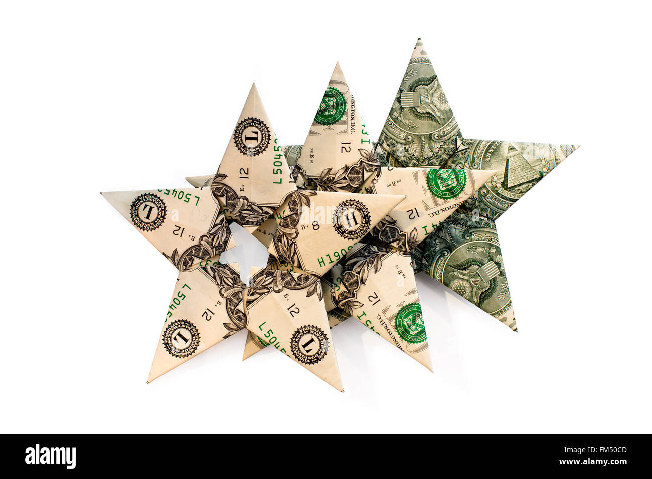 Trois variantes d'argent comptant des dollars empilés dans la forme de l'étoile pliée dans une rangée un par un comme des étoiles d'un verre de qualité Banque D'Images
