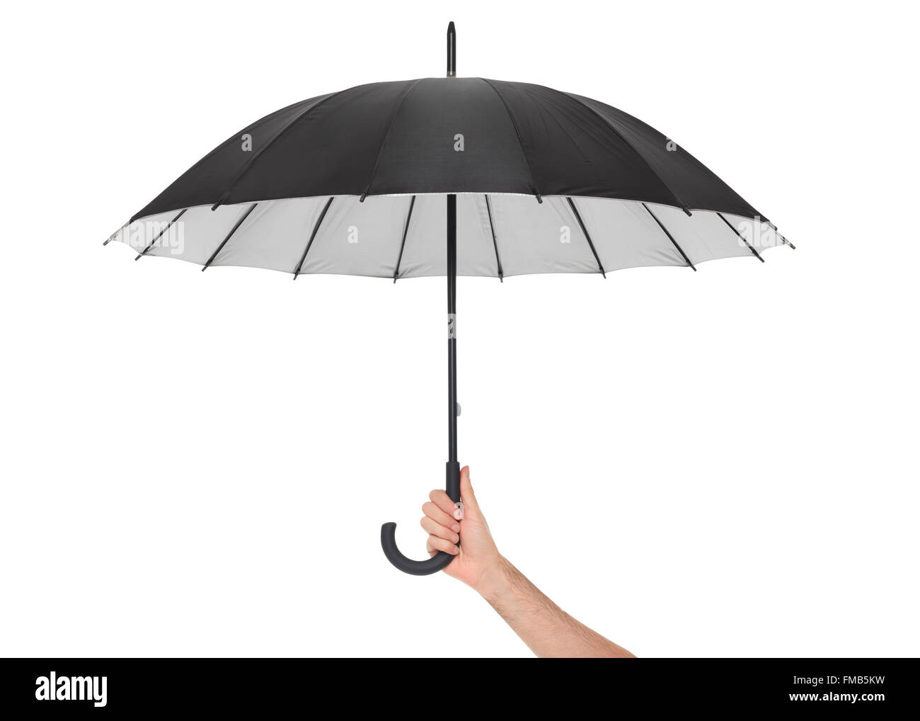 Main tenant parapluie noir sur blanc Banque D'Images