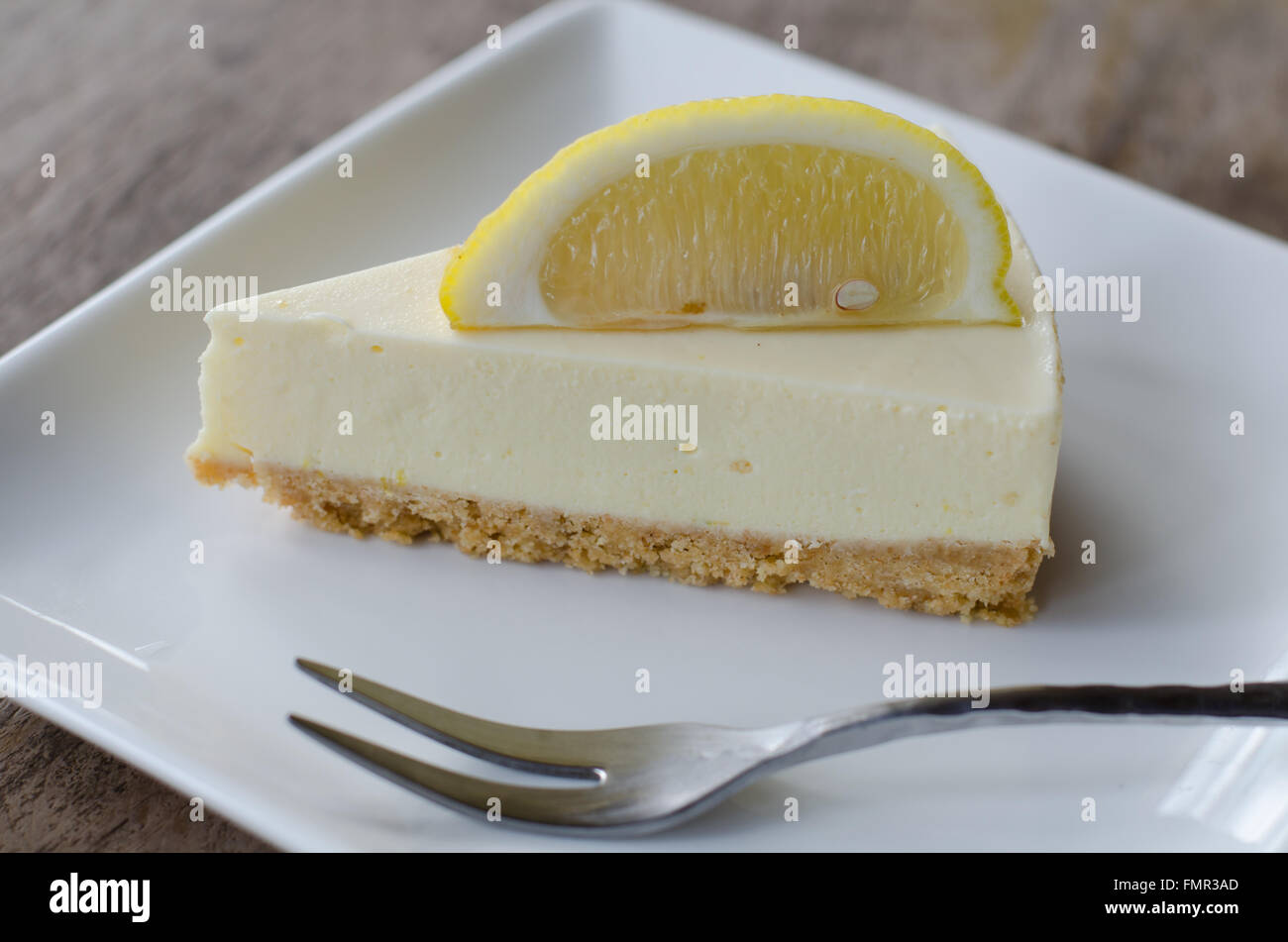 Tranche de citron cheesecake Banque D'Images