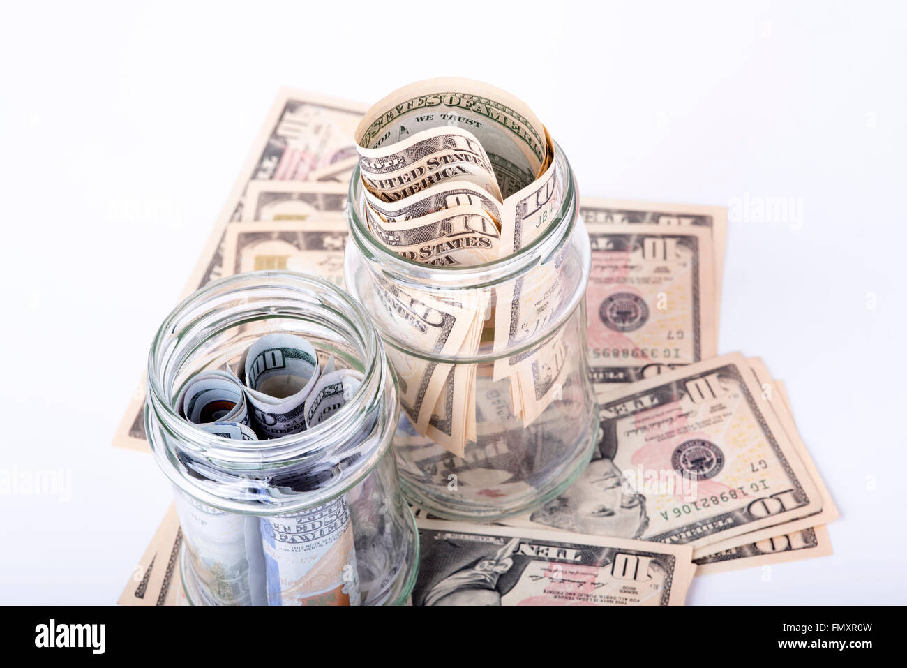 Photo montrant les économies en dollars cachés dans un pot Banque D'Images