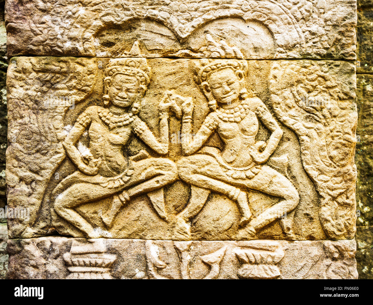 La sculpture sur pierre ancienne au temple Bayon à Siem Reap, Cambodge Banque D'Images